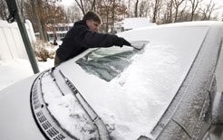 Clearing a windscreen of snow