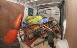 A secured load has moved following a simulated crash in this van
