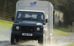 Land Rover Defender towing horsebox