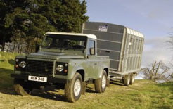 Land Rover Defender pick up towing horsebox