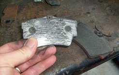 Brake pad worn to the metal