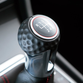 The golf ball-dimpled gear knob is reminiscent of the original 1976 GTi - the first hot hatch