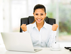 Businesswoman-using-company-car-tax-calculator-on-her-lap-top