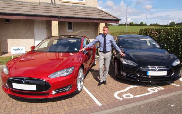 Ogilvie Fleet operations director Jim Hannah with the electric Tesla Model S cars