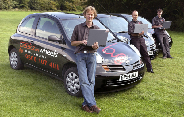 Watch out they are mobile now - Geeks on Wheels in front of their Toyota fleet