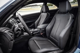 The leather upholstered cabin of the BMW M2
