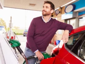 Man filling up a company car with fuel